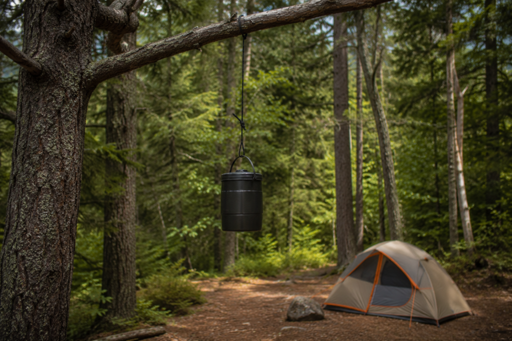 common camping mistakes food storage bear canister hang kit food suspended from tree branch campsite wildlife prevention